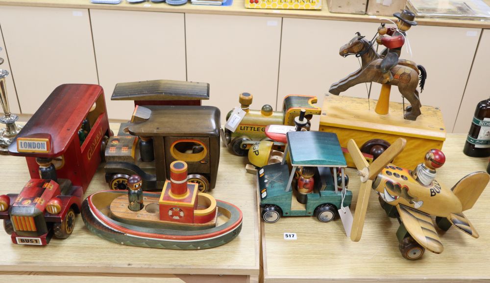 A collection of hand-crafted painted wooden toys, 1980s,